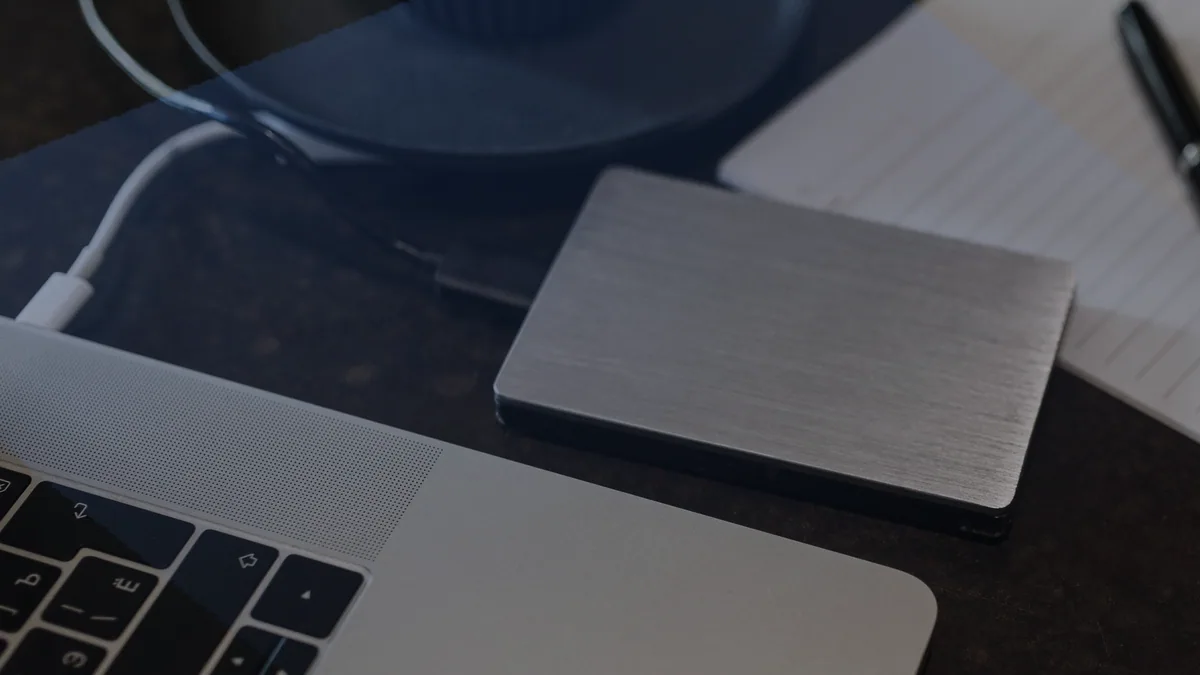 A laptop and an external drive: the two ends of most transfers.