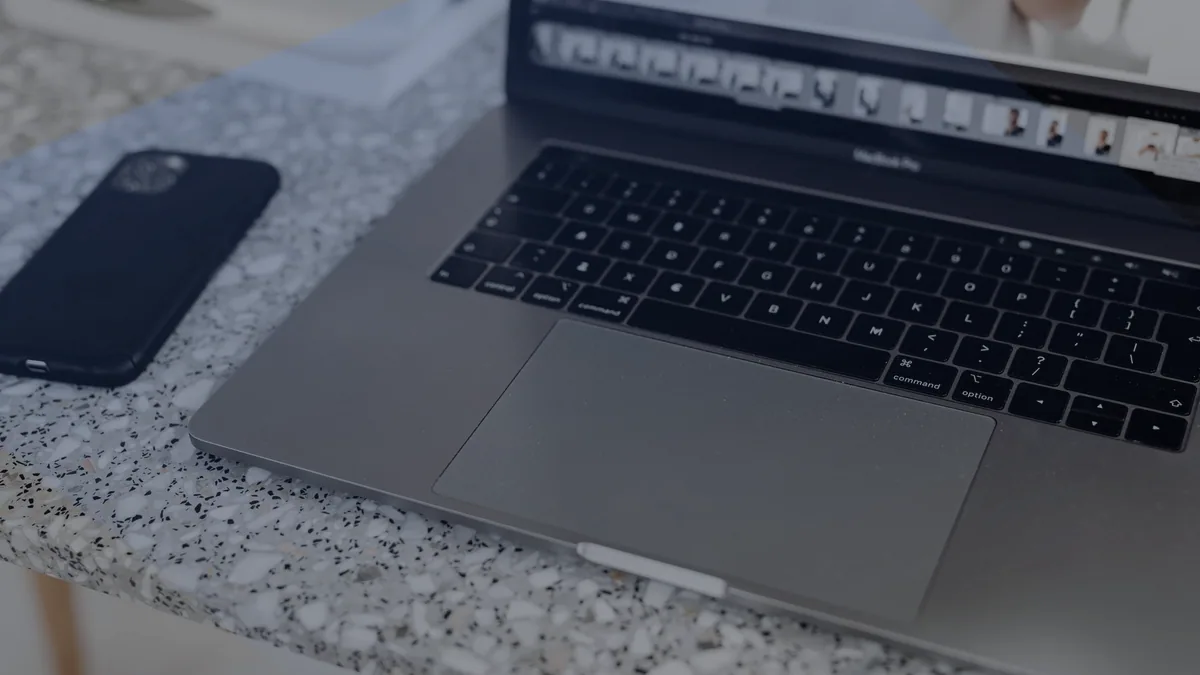 A phone and a laptop, the pair most people actually sync.